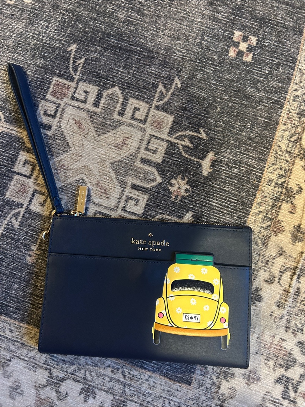 kate spade New York Navy Leather Wristlet with Yellow Taxi Graphic beep beep
